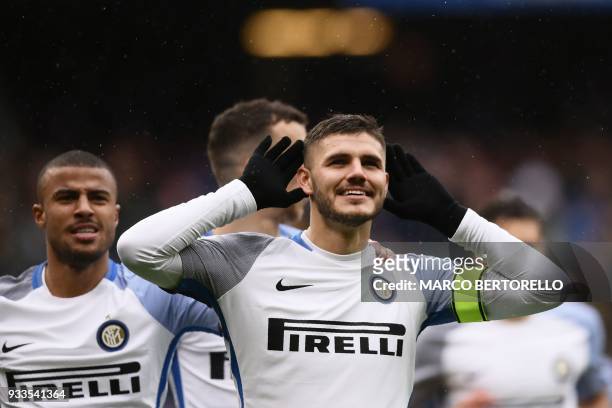 Inter Milan's forward Mauro Icardi from Argentina celebrates after scoring during the Italian Serie A football match Sampdoria Vs Inter Milan on...