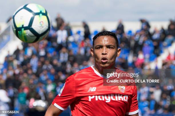 Sevilla's Colombian forward Luis Muriel eyes the ball during the Spanish League football match between Club Deportivo Leganes SAD and Sevilla FC at...