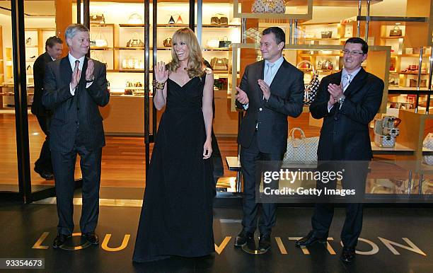Philip Corne, Toni Collette, Jean-Baptiste Debains and David Marcun during the ribbon cutting ceremony at opening of the new Louis Vuitton store at...