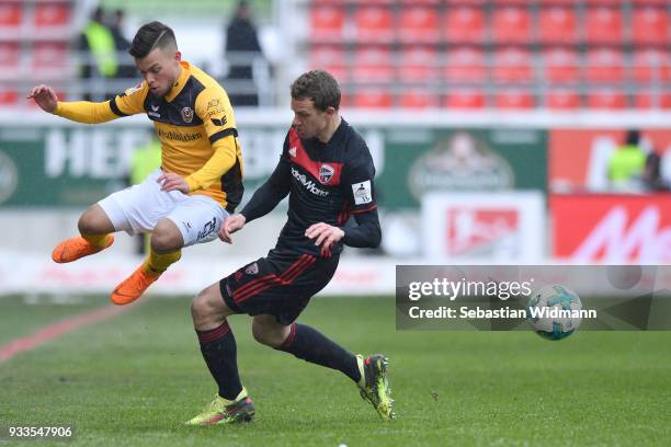 Sascha Horvath of Dresden and Marcel Gaus of Ingolstadt compete for the ball during the Second Bundesliga match between FC Ingolstadt 04 and SG...
