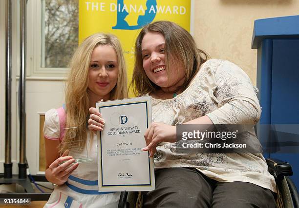 Diana Vickers presents Ceri Davies Gold Diana Award during the Diana Awards at Number 11 Downing Street on November 24, 2009 in London, England. The...
