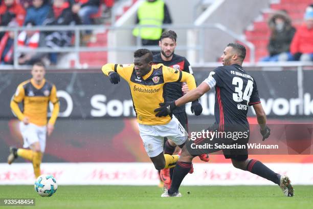 Moussa Kone of Dresden and Marvin Matip of Ingolstadt compete for the ball during the Second Bundesliga match between FC Ingolstadt 04 and SG Dynamo...