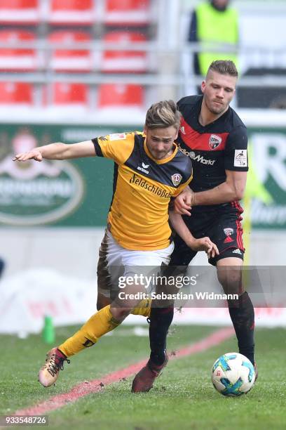 Lucas Roeser of Dresden and Robert Leipertz of Ingolstadt compete for the ball during the Second Bundesliga match between FC Ingolstadt 04 and SG...