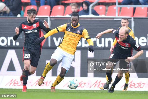 Christian Traesch of Ingolstadt and Erich Berko of Dresden compete for the ball during the Second Bundesliga match between FC Ingolstadt 04 and SG...