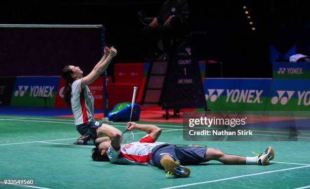 Yuta Watanabe and Arisa Higashino of Japan celebrate as they win the mixed doubles as they beat Zheng Siwei and Hunag Yaqiong of China on day five of...