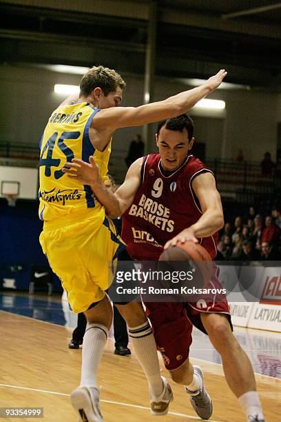 Karsten Tadda, #9 of Brose Baskets competes with Dairis Bertans, #45 of BK Ventspils during the Eurocup Basketball Regular Season 2009-2010 Game Day...