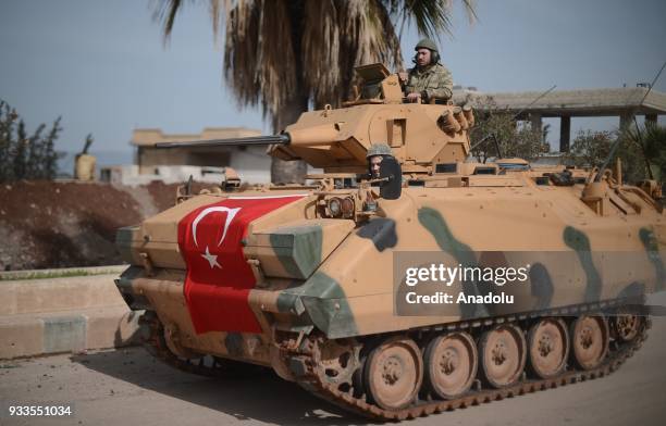 An armored vehicle belonging to Turkish army patrols in town center after Turkish Armed Forces and Free Syrian Army took complete control of...