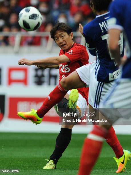 Tomoya Ugajin of Urawa Red Diamonds in action during the J.League J1 match between Urawa Red Diamonds and Yokohama F.Marinos at Saitama Stadium on...