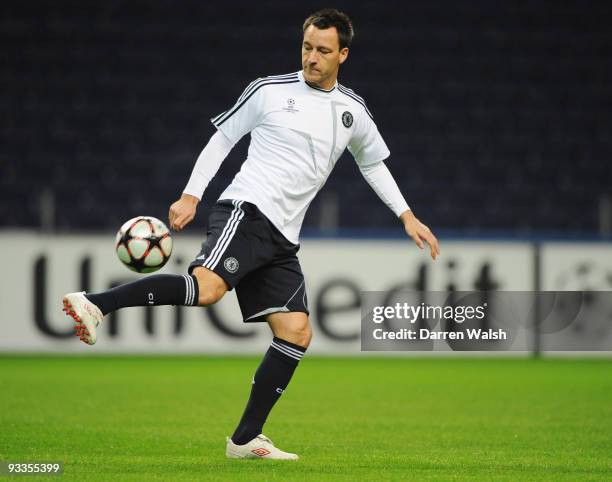 John Terry controls the ball during the Chelsea training session, prior to UEFA Champions League Group D match against FC Porto, at the Estadio...