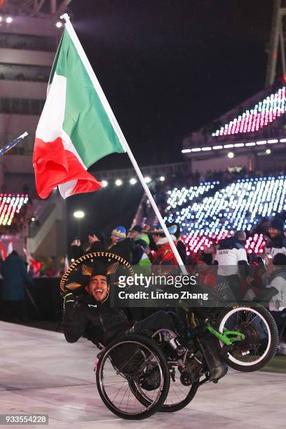 Flag bearer Arly Aristides Velasquez Penaloza of Mexico attend the closing ceremony of the PyeongChang 2018 Paralympic Games at the PyeongChang...