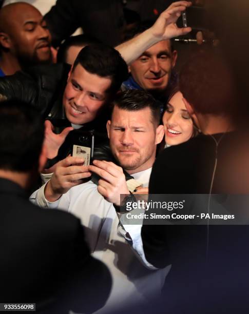 Fighter Michael Bisping poses with fans at The O2 Arena, London. PRESS ASSOCIATION Photo. Picture date: Saturday March 17, 2018. See PA Story UFC...