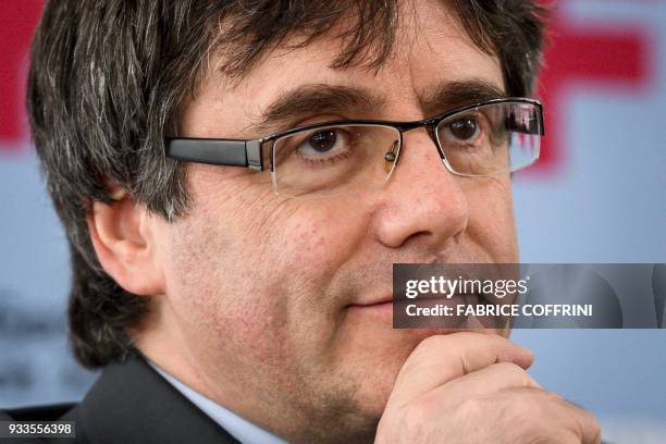 Catalonia's deposed leader Carles Puigdemont gestures during an interview on the sideline of the International film festival and forum of the human...