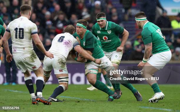 Stander of Ireland takes on Chris Robshaw during the NatWest Six Nations match between England and Ireland at Twickenham Stadium on March 17, 2018 in...