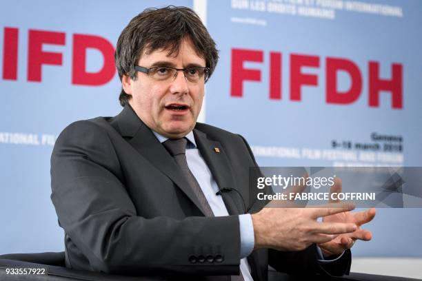 Catalonia's deposed leader Carles Puigdemont talks during an interview on the sideline of the International film festival and forum of the human...