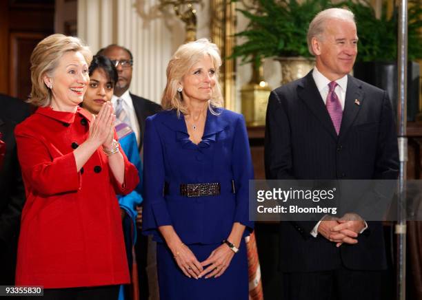 Hillary Clinton, U.S. Secretary of state, left, Joseph Biden, U.S. Vice president, right, and his wife Jill Biden wait for U.S. President Barack...