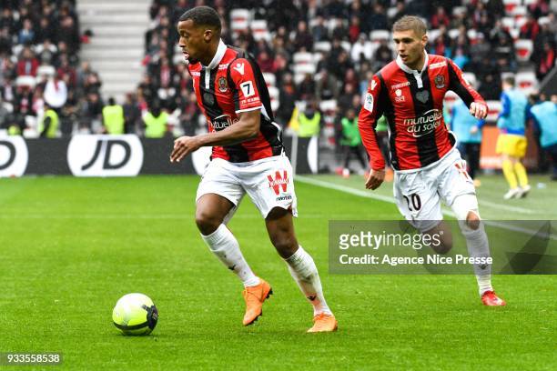 Alassane Plea and Maxime Le Marchand of Nice during the Ligue 1 match between OGC Nice and Paris Saint Germain at Allianz Riviera on March 18, 2018...
