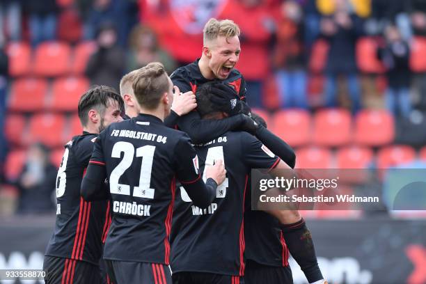 Sonny Kittel of Ingolstadt celebrates with his teammates their fourth goal during the Second Bundesliga match between FC Ingolstadt 04 and SG Dynamo...