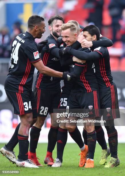 Sonny Kittel of Ingolstadt celebrates with his teammates their fourth goal during the Second Bundesliga match between FC Ingolstadt 04 and SG Dynamo...