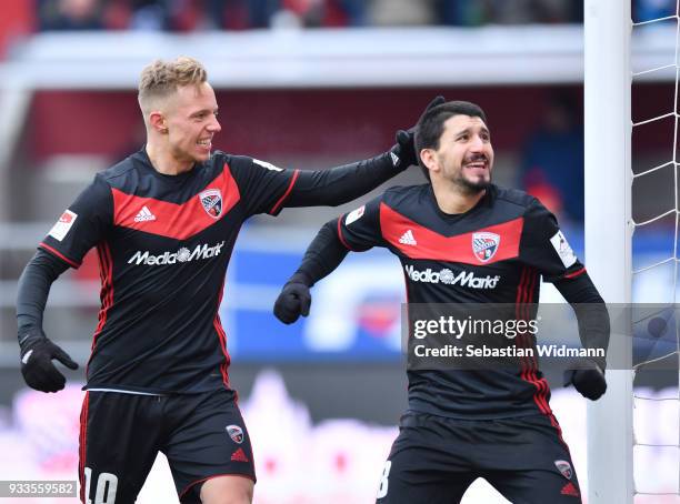 Sonny Kittel and Almog Cohen of Ingolstadt celebrate their teams fourth goal during the Second Bundesliga match between FC Ingolstadt 04 and SG...
