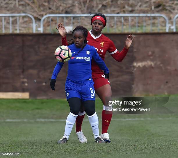 Satara Murray of Liverpool Ladies competes with Eniola Aluko of Chelsea Ladies during the SSE Women's FA Cup Quarter Final match between Liverpool...