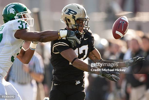 Aaron Valentin of the Purdue Boilermakers bobbles a pass reception attempt during action against the Michigan State Spartans at Ross-Ade Stadium on...