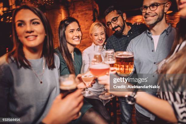 toast to our friendship - happy hours stock pictures, royalty-free photos & images