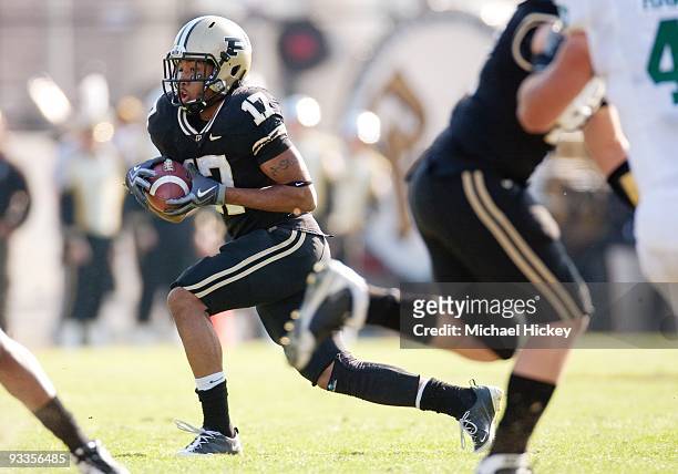 Aaron Valentin of the Purdue Boilermakers runs the ball during action against the Michigan State Spartans at Ross-Ade Stadium on November 14, 2009 in...