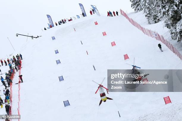 Mikael Kingsbury of Canada takes 1st place, Bradley Wilson of USA takes 3rd place during the FIS Freestyle Ski World Cup Men's and Women's Moguls...