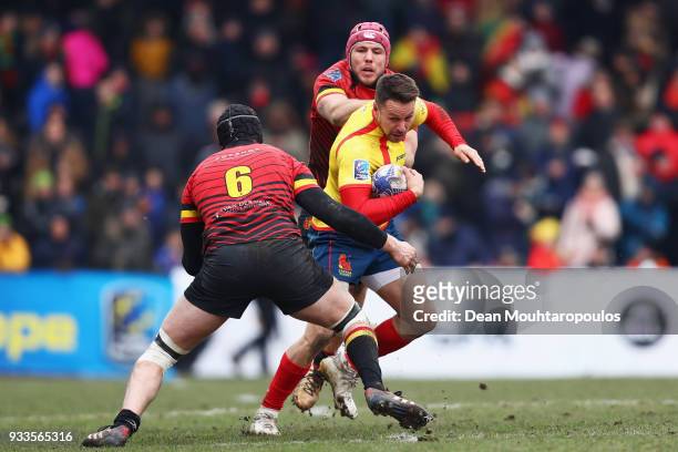Bradley Linklater of Spain battles for the ball with Gillian Benoy and Thomas Demolder of Belgium during the Rugby World Cup 2019 Europe Qualifier...