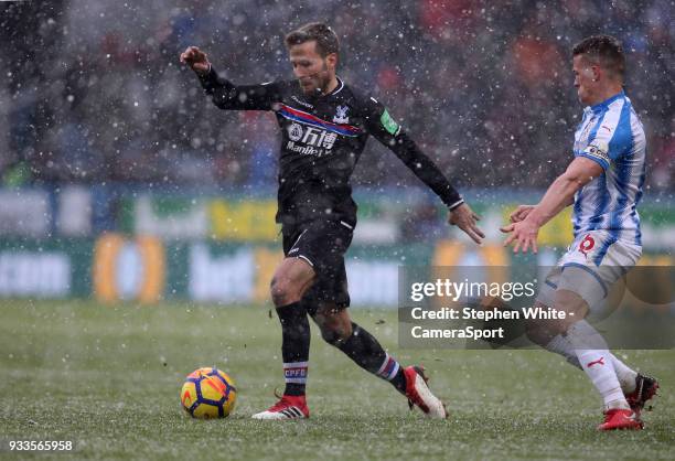 Crystal Palace's Yohan Cabaye and Huddersfield Town's Jonathan Hogg during the Premier League match between Huddersfield Town and Crystal Palace at...