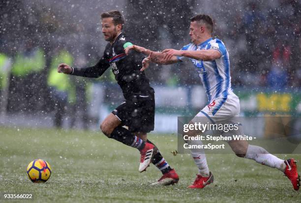 Crystal Palace's Yohan Cabaye and Huddersfield Town's Jonathan Hogg during the Premier League match between Huddersfield Town and Crystal Palace at...