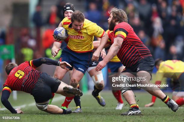 Maxime Jadot and Julien Berger of Belgium stop Ross Daniel Snee of Spain during the Rugby World Cup 2019 Europe Qualifier match between Belgium and...