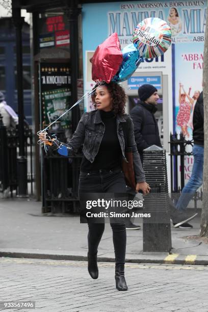 Rochelle Humes seen arriving to Global Media for Marvin Humes birthday with balloons on March 18, 2018 in London, England.