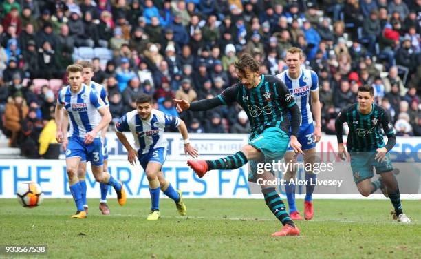 Manolo Gabbiadini of Southampton misses a penalty as it is saved by Christian Walton of Wigan Athletic during The Emirates FA Cup Quarter Final match...