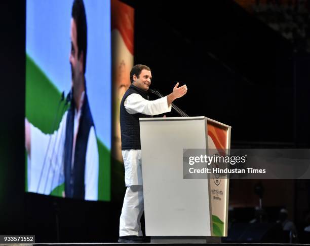 Congress president Rahul Gandhi speaks during the second day of the 84th Plenary Session of Indian National Congress at the Indira Gandhi stadium, on...