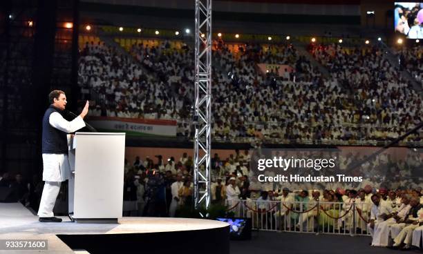 Congress president Rahul Gandhi speaks during the second day of the 84th Plenary Session of Indian National Congress at the Indira Gandhi stadium, on...