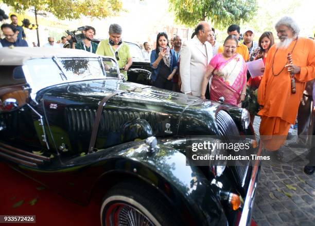 Lok Sabha speaker Sumitra Mahajan having a close look at the cars during the JK Tyre Constitution Club Car Rally 2018, to raise awareness on safe...