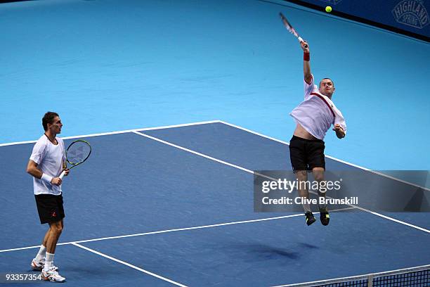 Frantisek Cermak of Czech Republic plays with Michal Mertinak of Slovakia during the men's doubles second round match against Daniel Nestor of Canada...