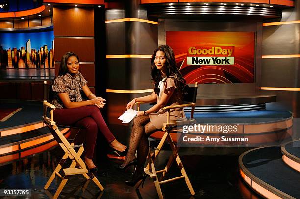 Actress Keke Palmer and reporter Julie Chang on the set of Good Day New York at the Good Day Studio on November 24, 2009 in New York City.