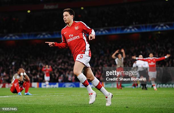 Samir Nasri of Arsenal celebrates scoring the first goal during the UEFA Champions League group H match between Arsenal and Standard Liege at...