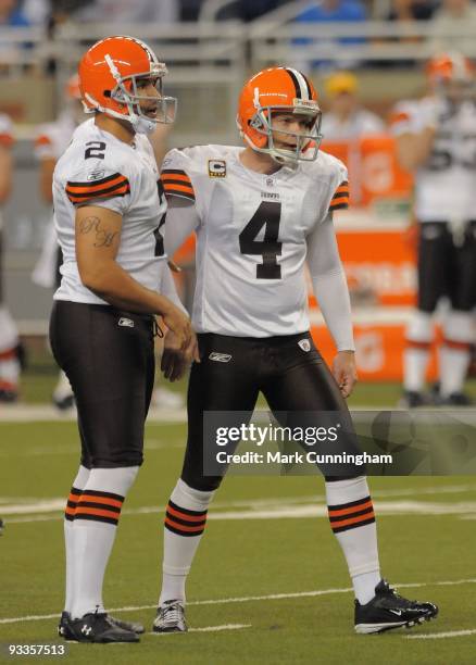 Reggie Hodges and Phil Dawson of the Cleveland Browns stand on the field after an extra point attempt against the Detroit Lions at Ford Field on...