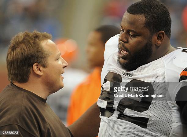 Cleveland Browns head coach Eric Mangini and Shaun Rogers talk on the sidelines during the game against the Detroit Lions at Ford Field on November...