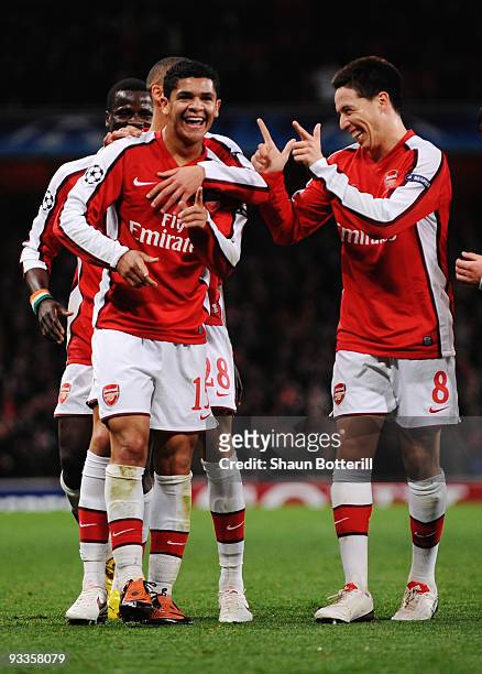 Denilson of Arsenal celebrates scoring their second goal during the UEFA Champions League group H match between Arsenal and Standard Liege at...