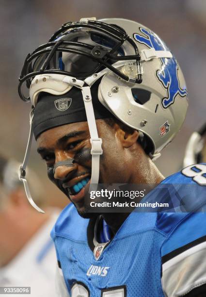 Calvin Johnson of the Detroit Lions looks on and smiles during the game against the Cleveland Browns at Ford Field on November 22, 2009 in Detroit,...