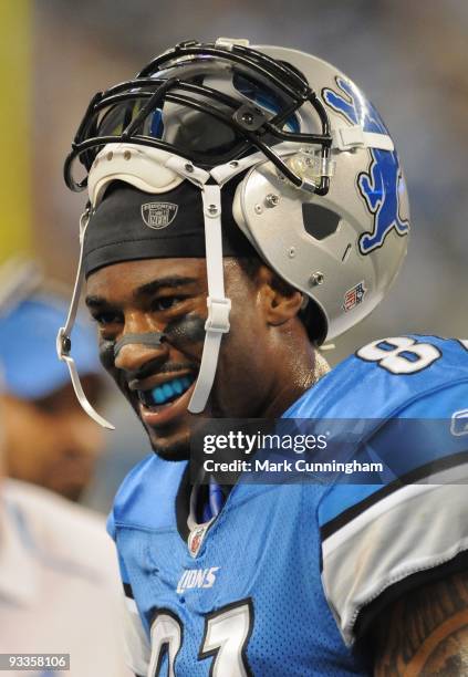 Calvin Johnson of the Detroit Lions looks on and smiles during the game against the Cleveland Browns at Ford Field on November 22, 2009 in Detroit,...