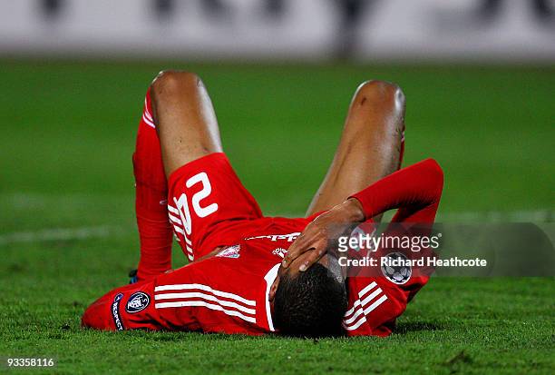 David Ngog of Liverpool lies on the ground during the UEFA Champions League group E match between Debrecen and Liverpool at the Ferenc Puskas Stadium...