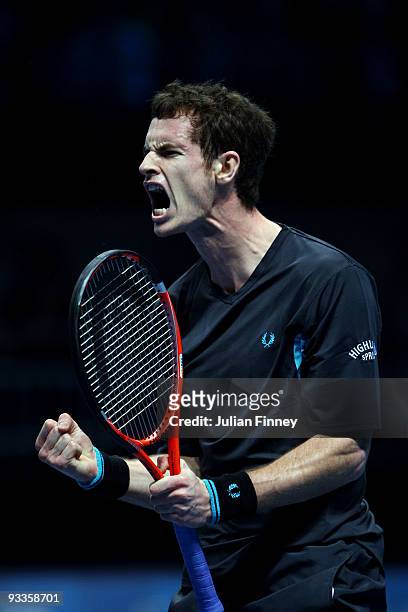 Andy Murray of Great Britain celebrates a point during the men's singles second round match against Roger Federer of Switzerland during the Barclays...