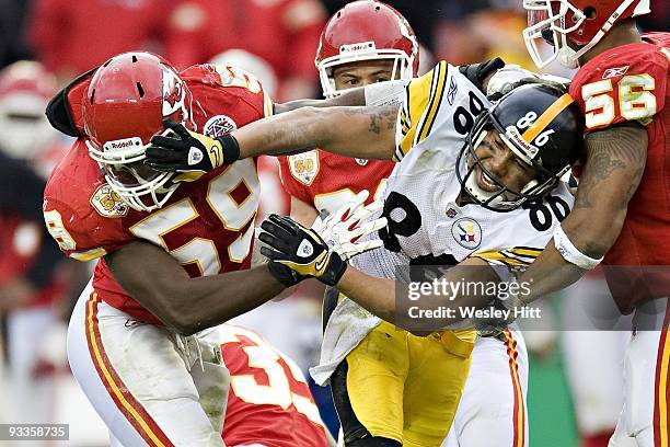 Wide receiver Hines Ward of the Pittsburgh Steelers and linebacker Jovan Belcher ofthe Kansas City Chiefs get in a shoving match at Arrowhead Stadium...