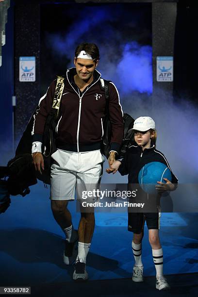 Roger Federer of Switzerland arrives during the men's singles second round match against Andy Murray of Great Britain during the Barclays ATP World...