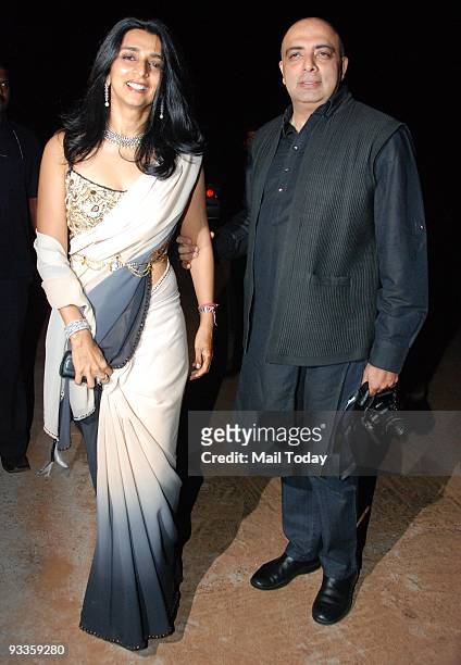 Tarun Tahiliani arrives with his wife for the wedding of Bollywood actress Shilpa Shetty with businessman Raj Kundra in Khandala on Sunday, November...